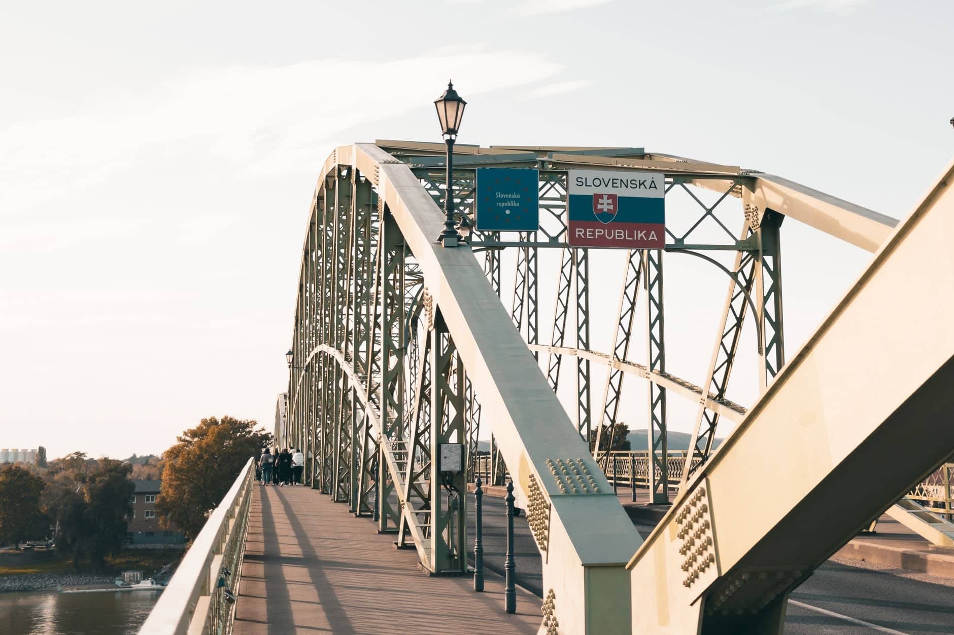 A scenic view of Maria Valeria Bridge connecting Hungary and Slovakia over the Danube River.