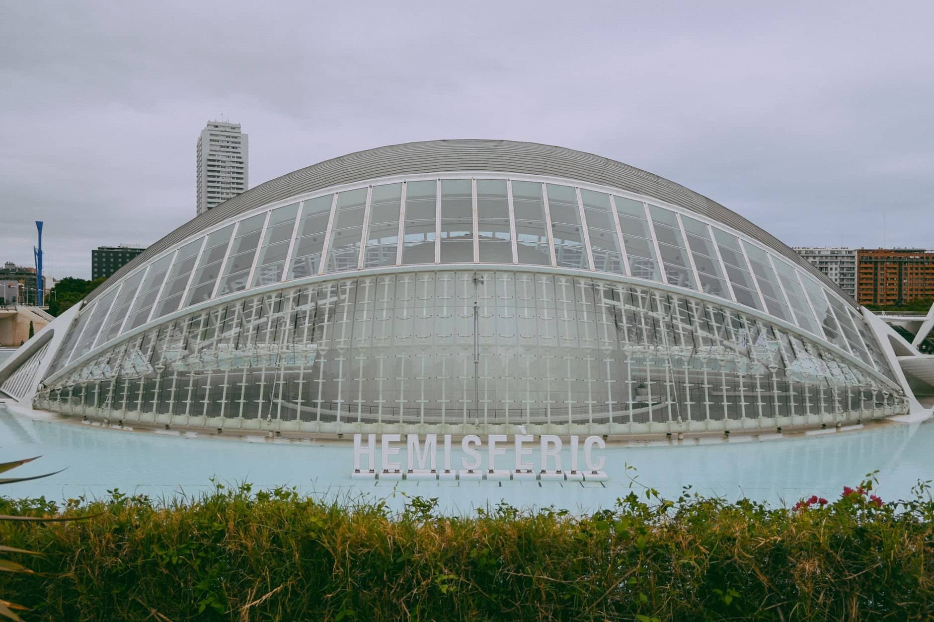 Iconic Hemisferic at City of Arts and Sciences in Valencia, showcasing modern architectural design.