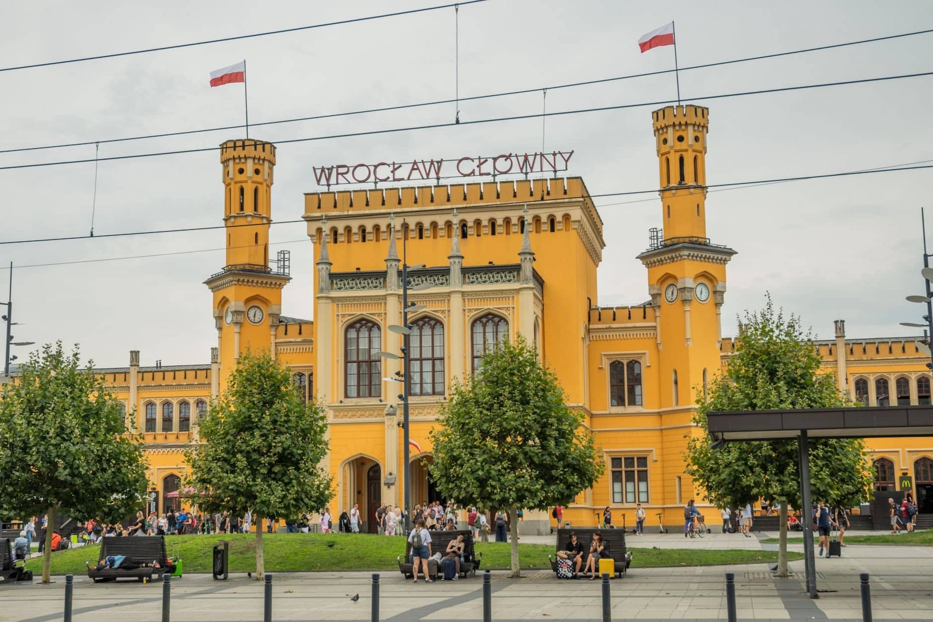 Vibrant facade of Wrocław Główny train station, a key landmark in Wrocław, Poland.
