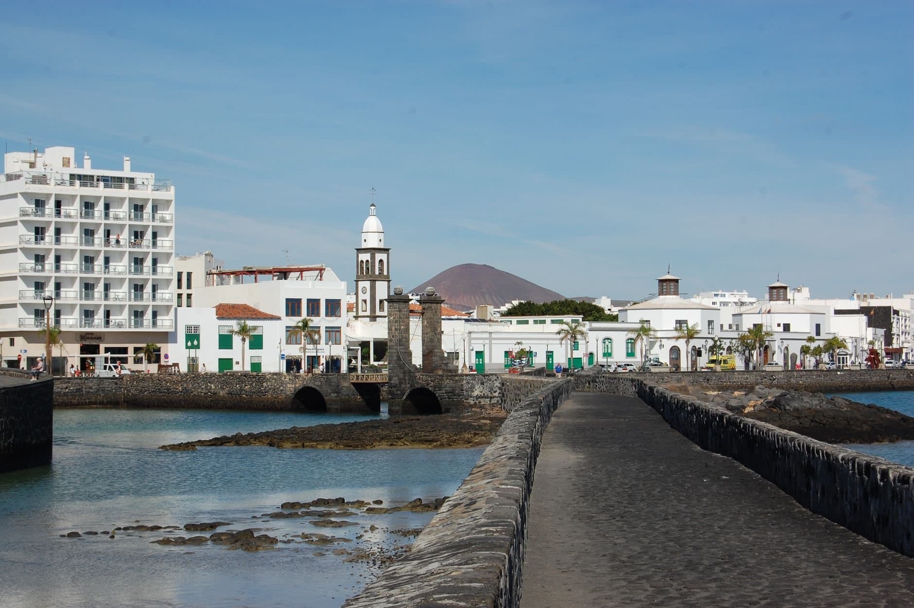 View of the scenic townscape with traditional architecture by the coastal promenade in Lanzarote.
