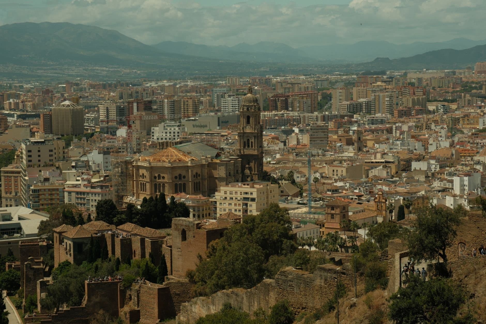 Explore the historic architecture and cityscape of Malaga, Spain.