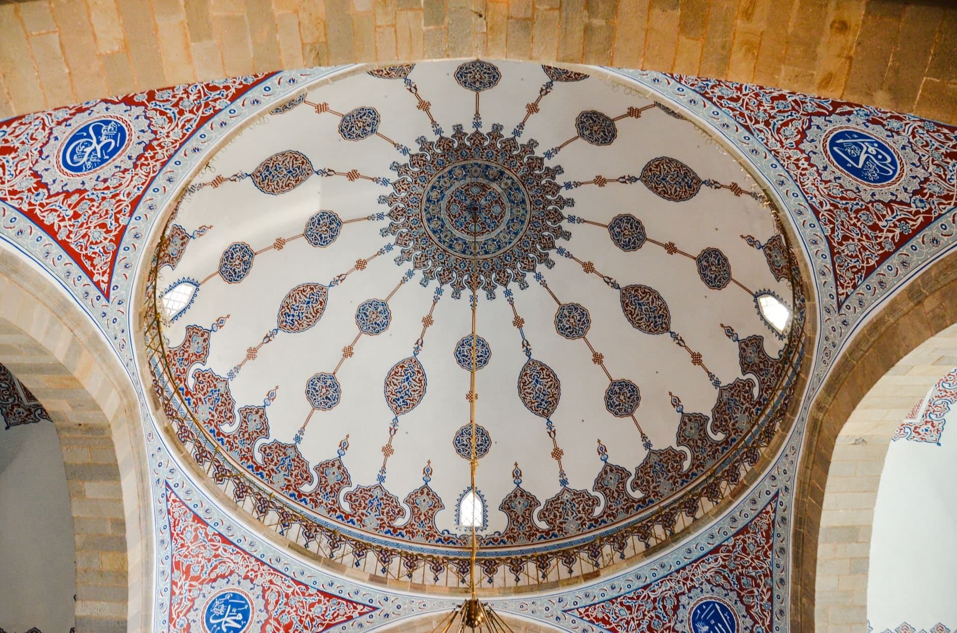 Intricate dome ceiling with Islamic patterns in a mosque in Erzurum, Türkiye.