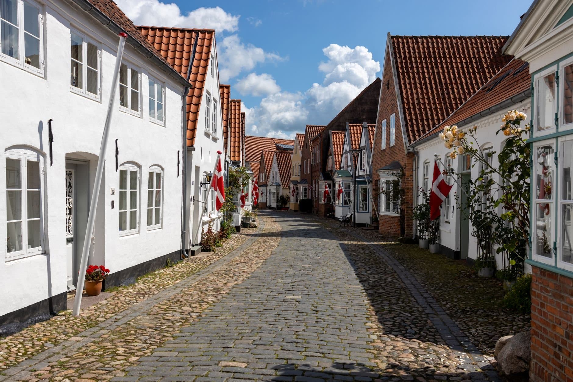 Explore the quaint architecture and charming cobblestone streets of Tondern, Denmark. Perfect for travel enthusiasts.