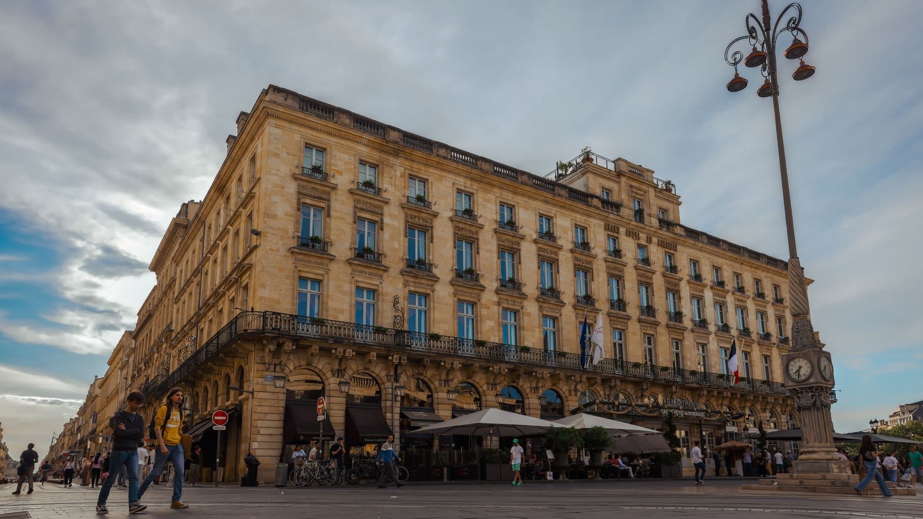 Daytime view of a historic building in Bordeaux, France, showcasing its classic architecture.