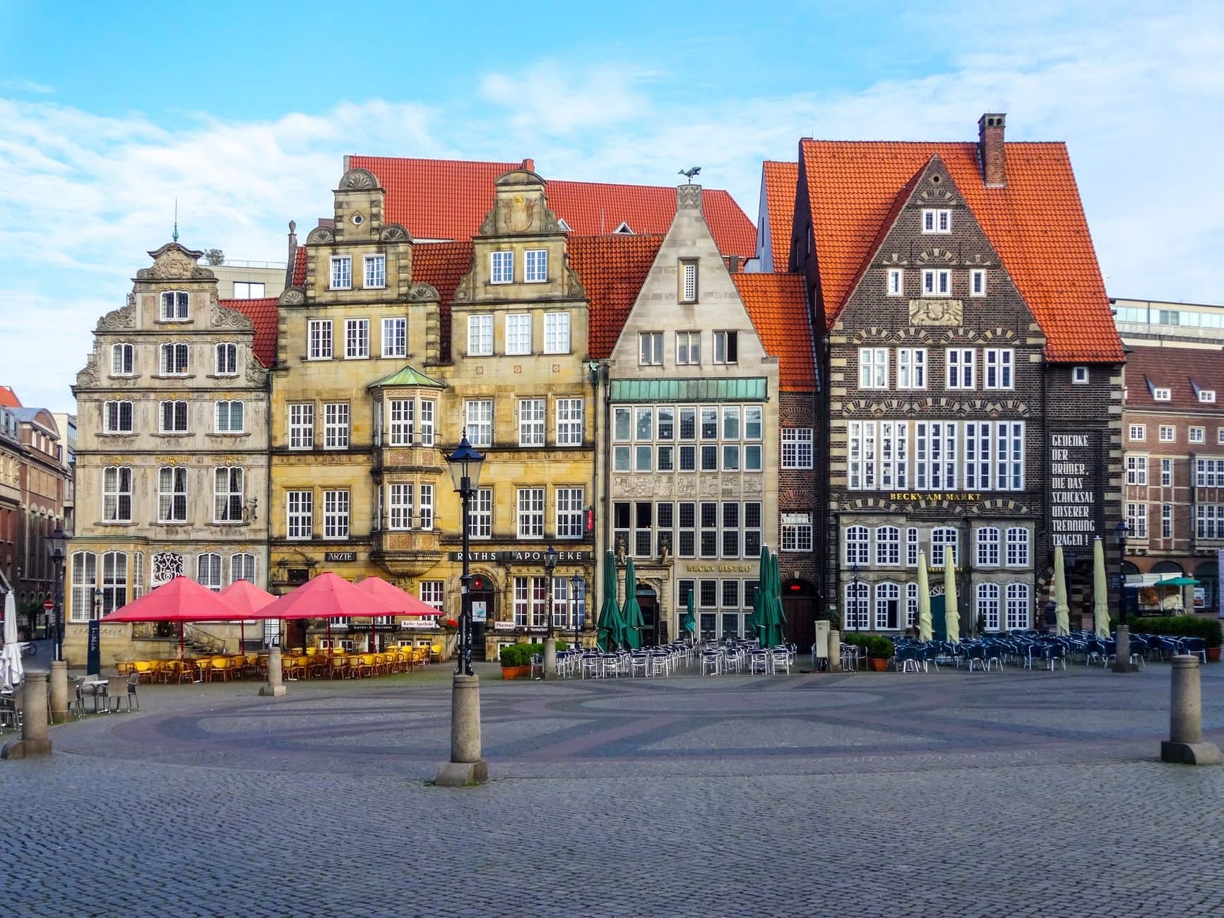 Historic facades in Bremen's famous market square on a clear day.
