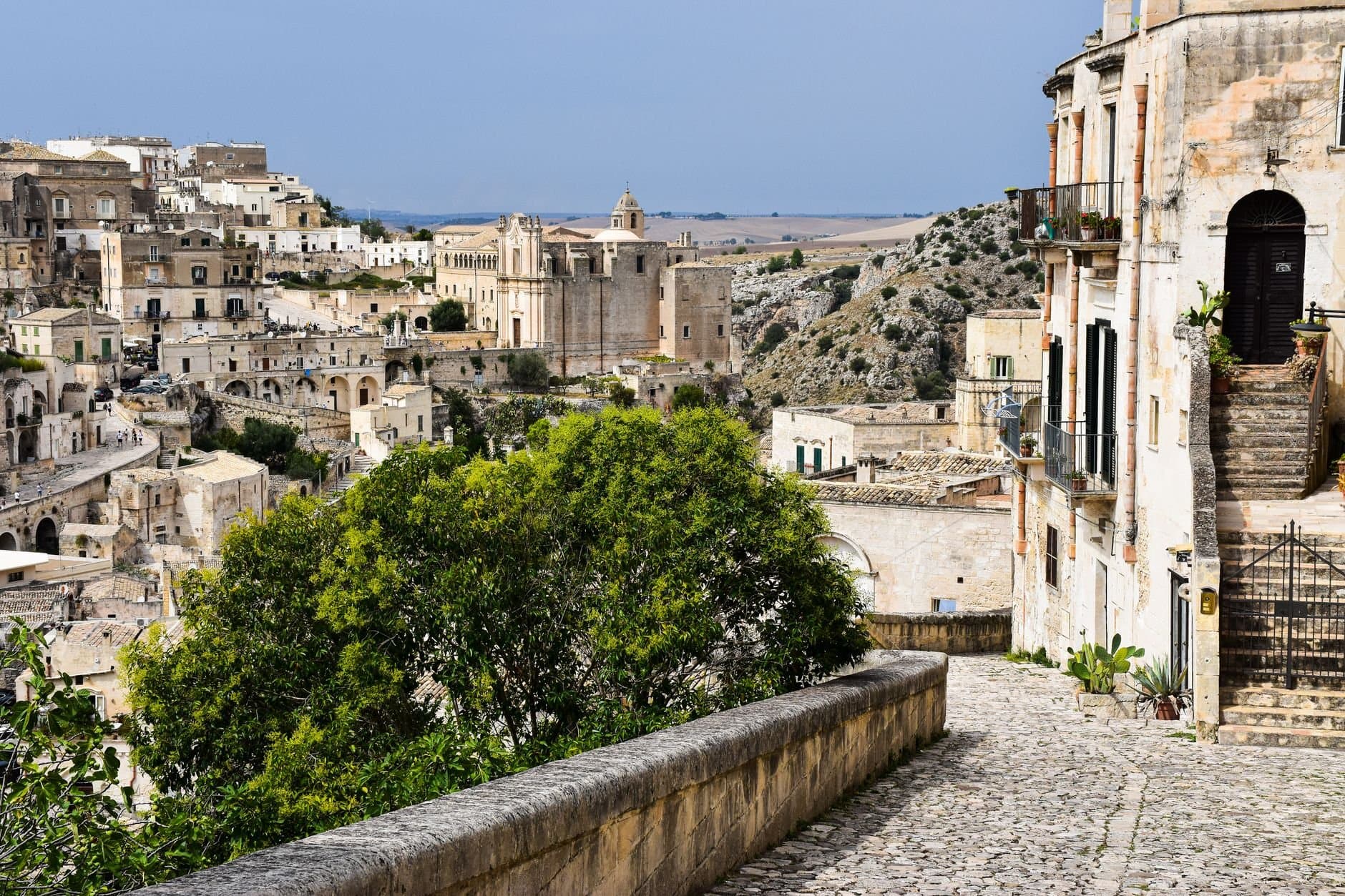 Explore the historic architecture and landscape of Matera in Apulia, Italy.