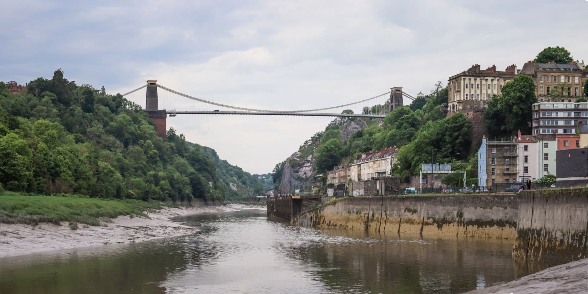 Scenic view of the iconic Clifton Suspension Bridge spanning the Avon Gorge in Bristol, England.