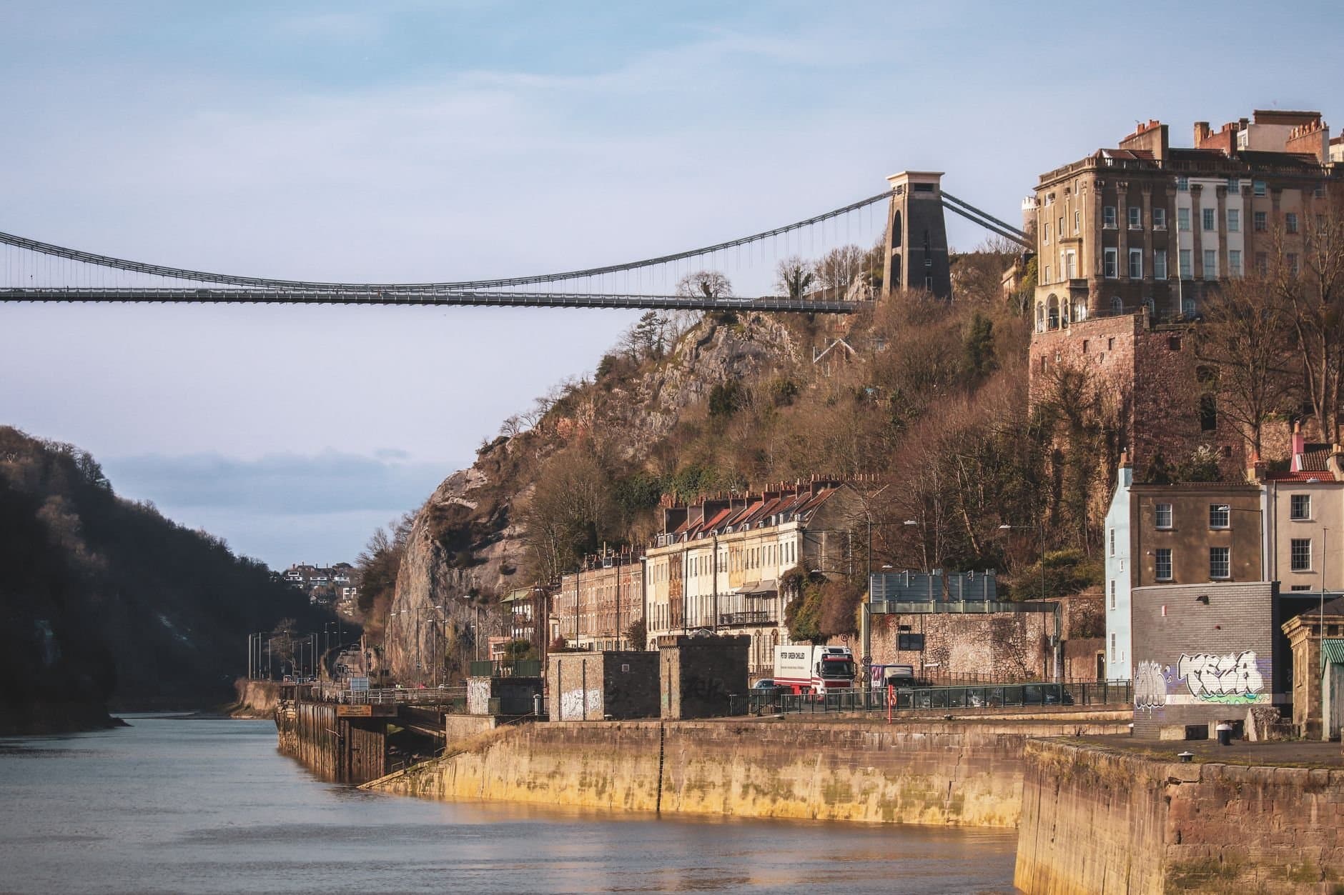 View of Clifton Suspension Bridge and Avon Gorge with surrounding landscape.