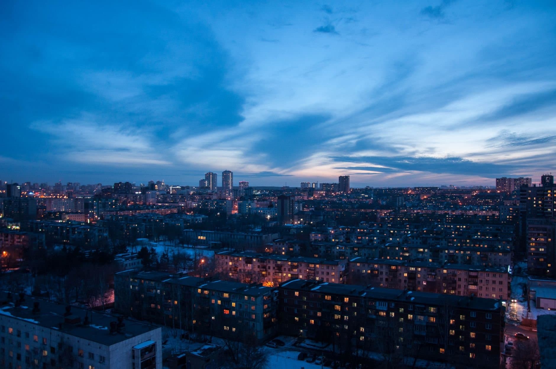 A stunning twilight view of Chelyabinsk, Russia, showcasing the city's expansive skyline and architecture.