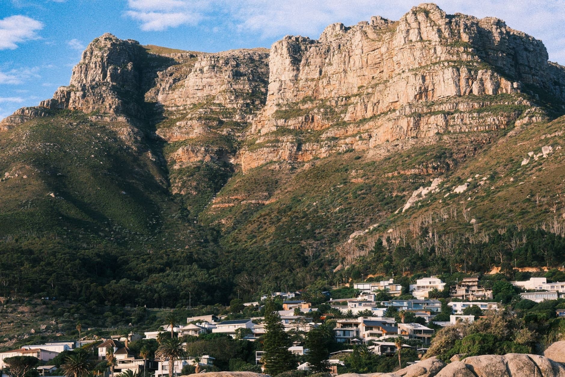A picturesque view of mountains and suburbs near Cape Town, South Africa.