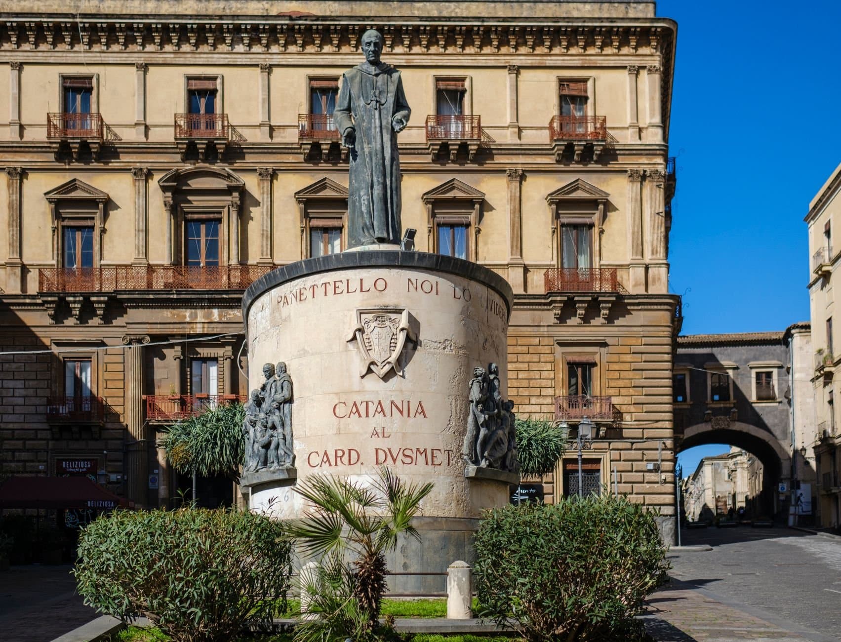 Statue of Cardinal Dusmet in Catania, Sicily, a prominent historical site.