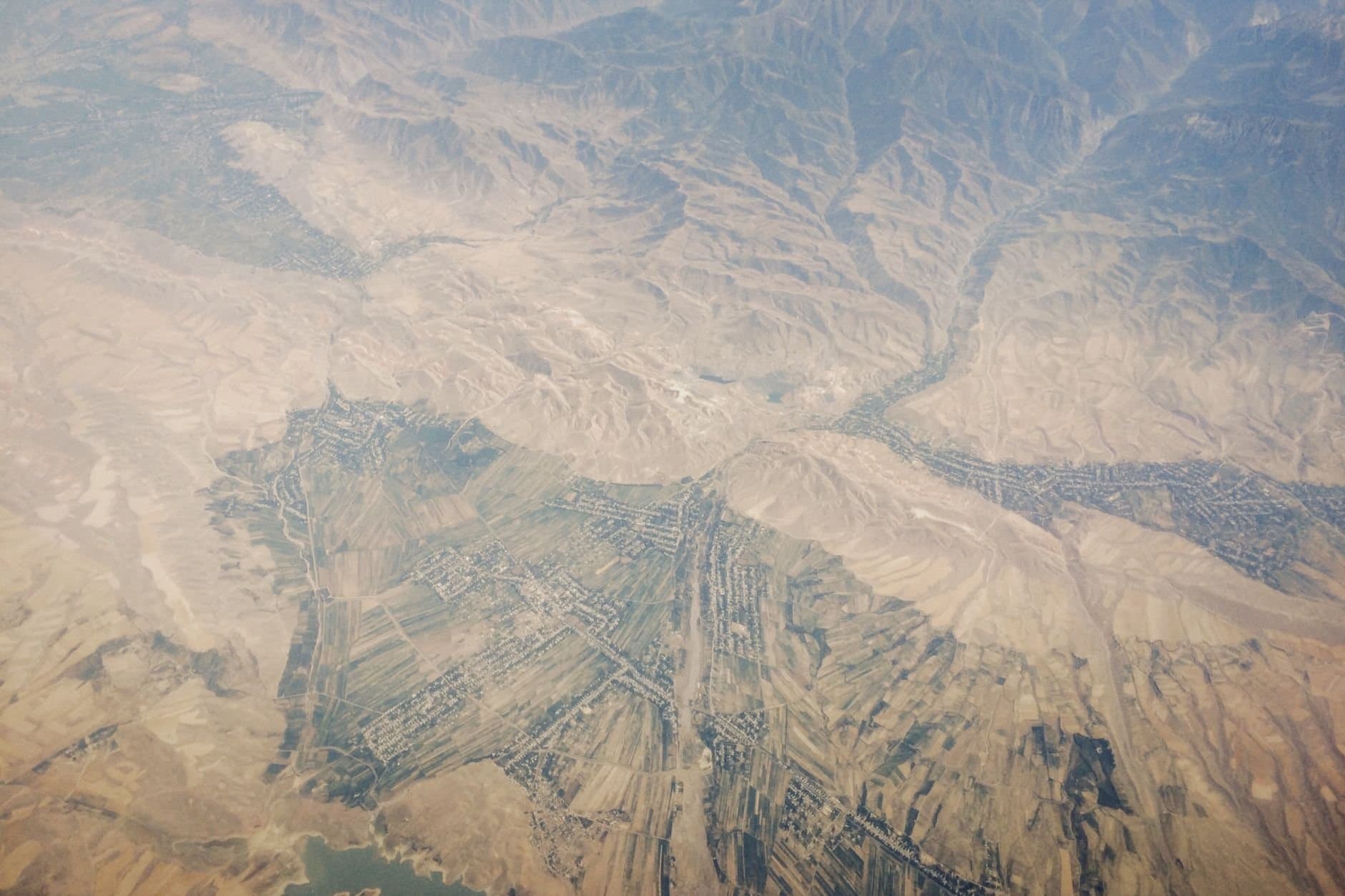 Spectacular view of beige endless hills located in highlands in daylight in mountainous valley