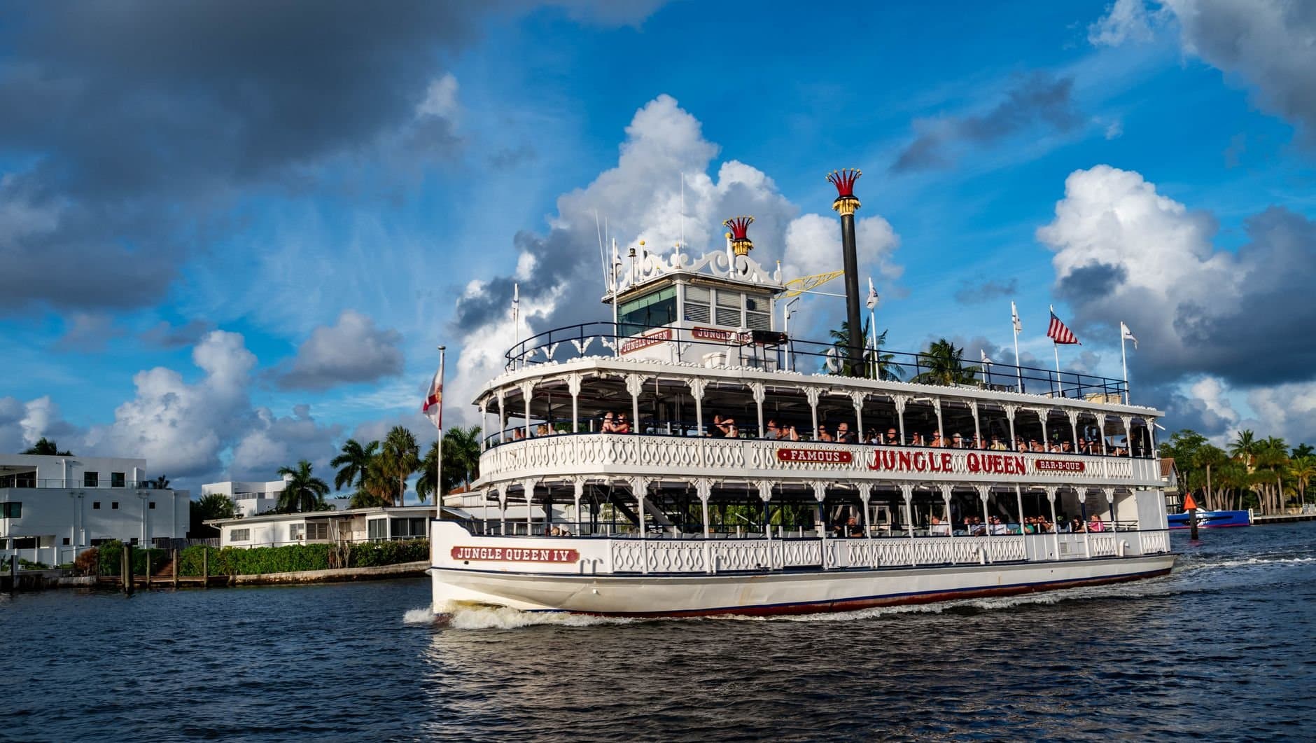 Enjoy a scenic cruise on the Jungle Queen riverboat in beautiful weather.