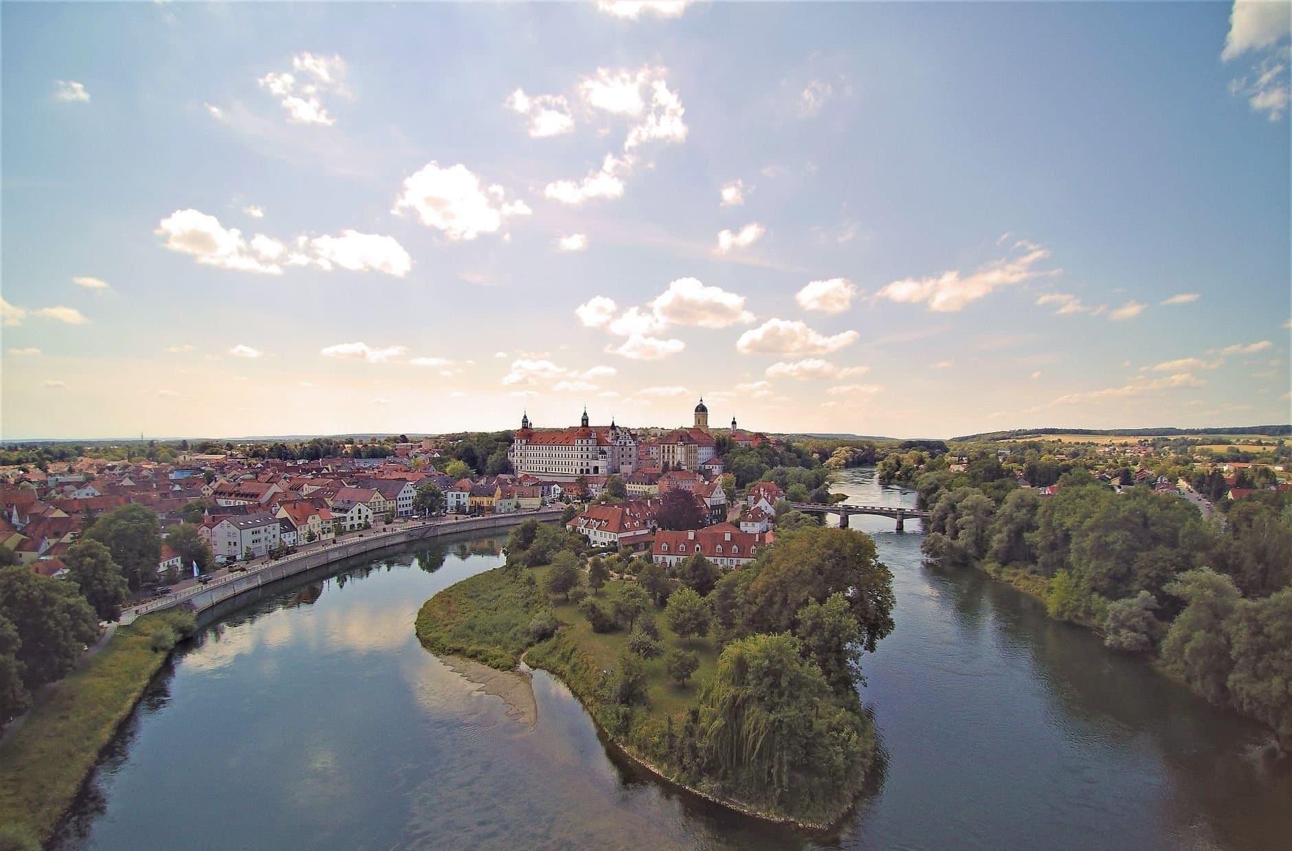 Aerial view of Neuburg an der Donau showcasing the town and scenic river bend.