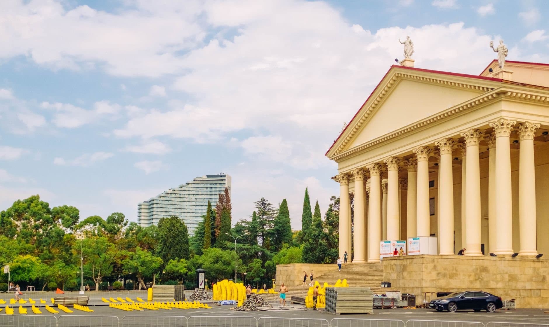 A neoclassical building with columns in Sochi, showcasing the iconic architecture and surroundings.