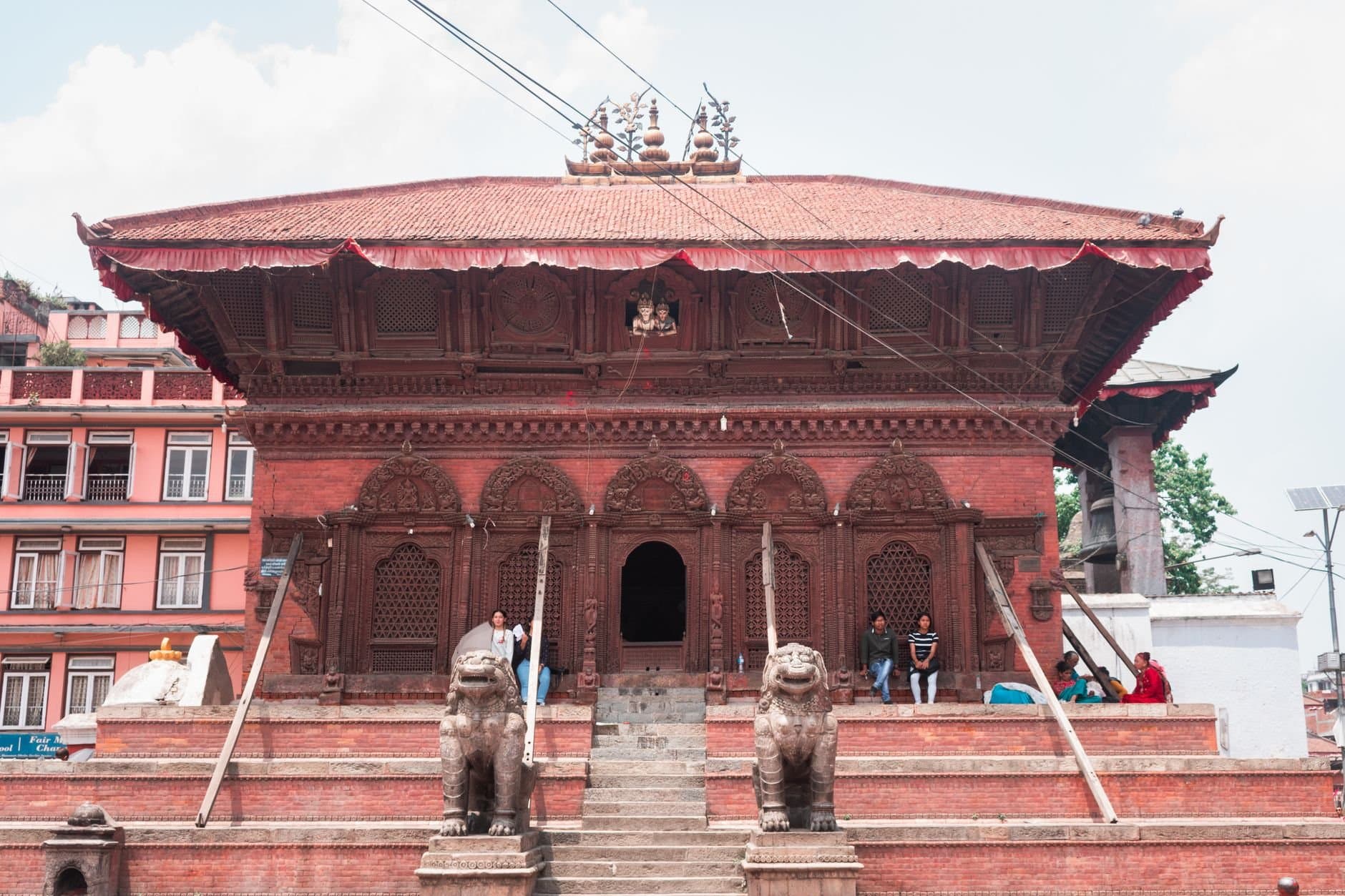 A detailed view of a historic temple in Kathmandu's Durbar Square featuring traditional architecture.