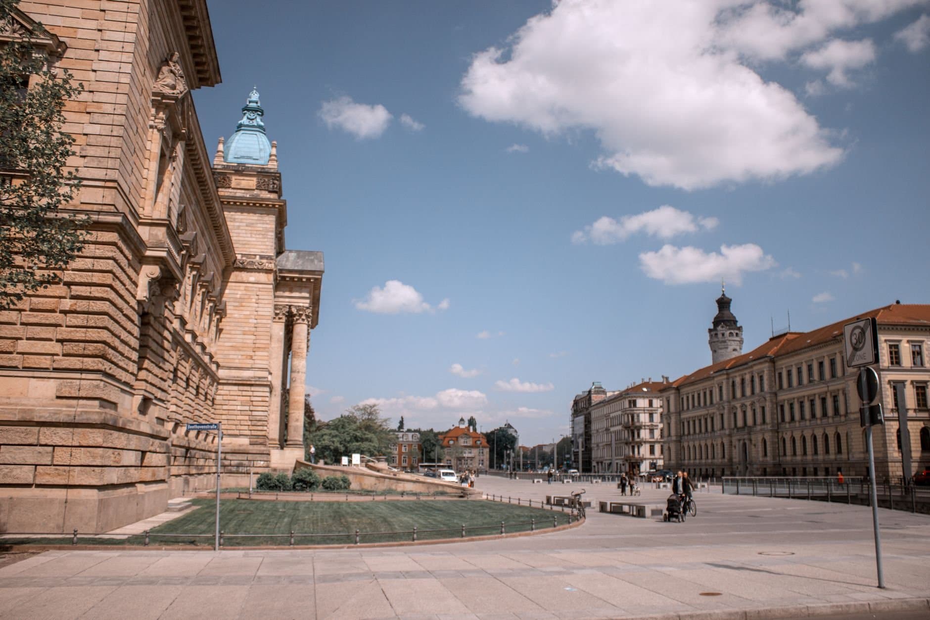 Explore Leipzig's historic architecture in Germany with clear blue skies and classic buildings.