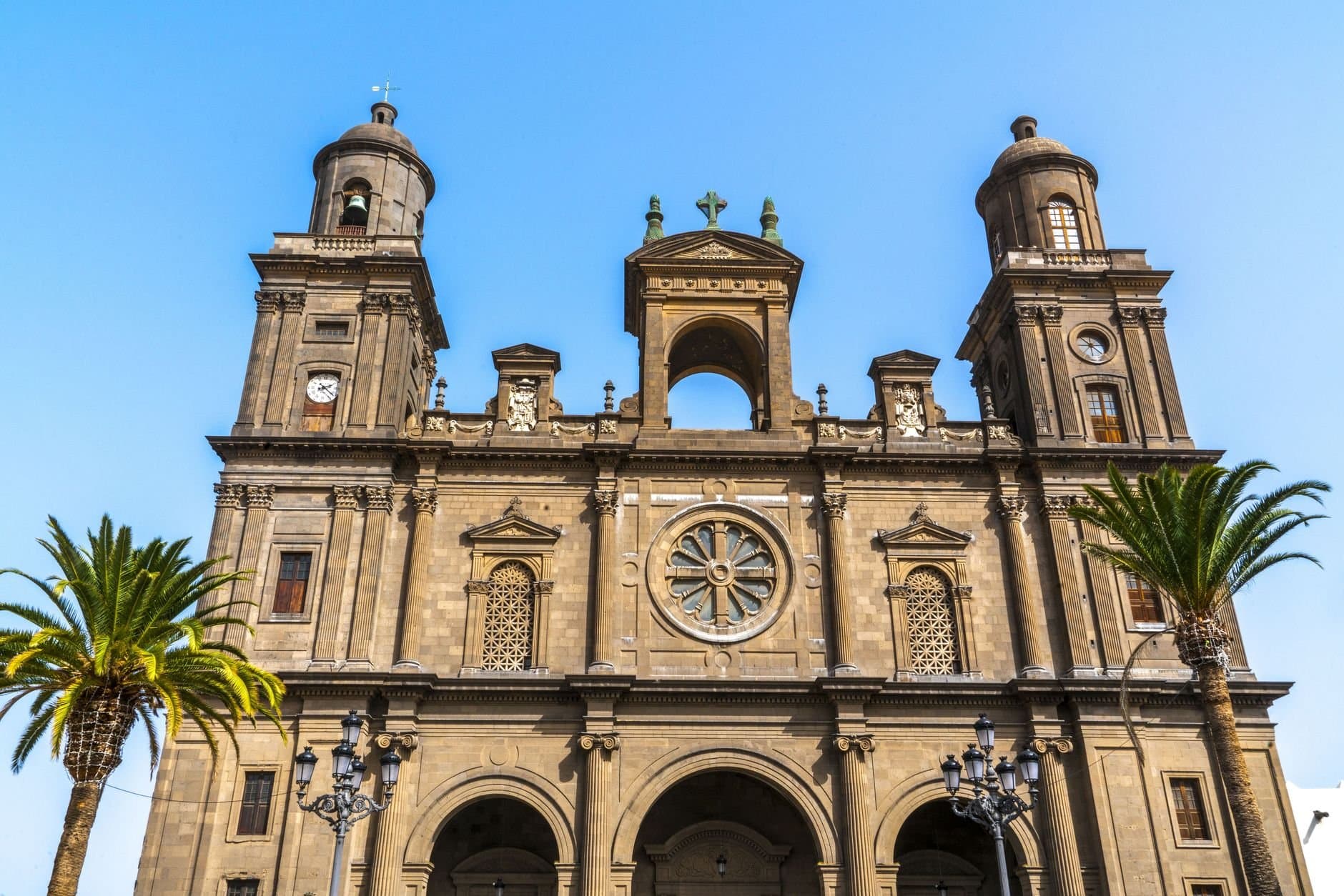 Front view of the iconic cathedral facade in Las Palmas de Gran Canaria, showcasing baroque architecture.