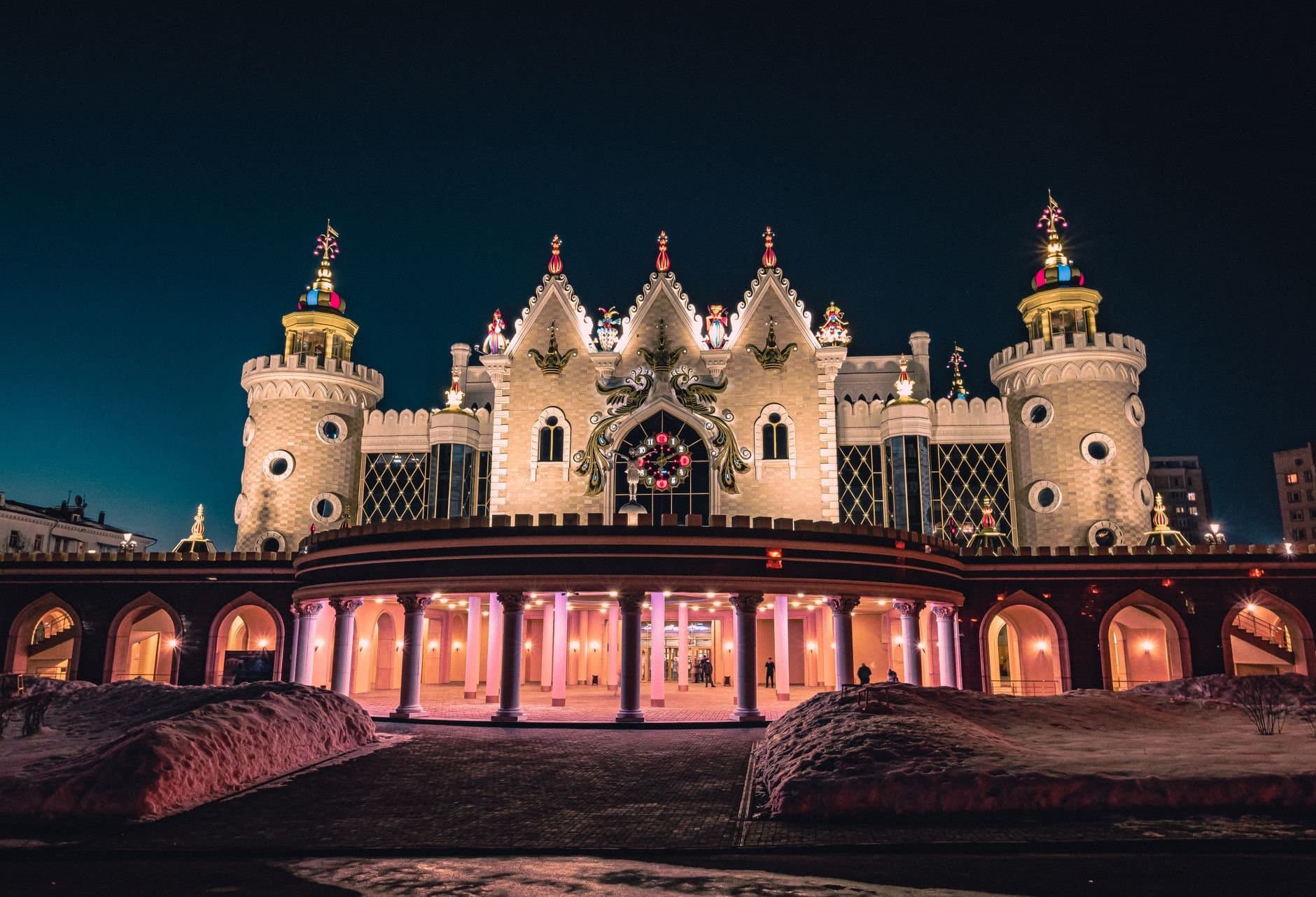 Enchanting view of the fairytale Ekiyat Puppet Theater illuminated at night in Russia.