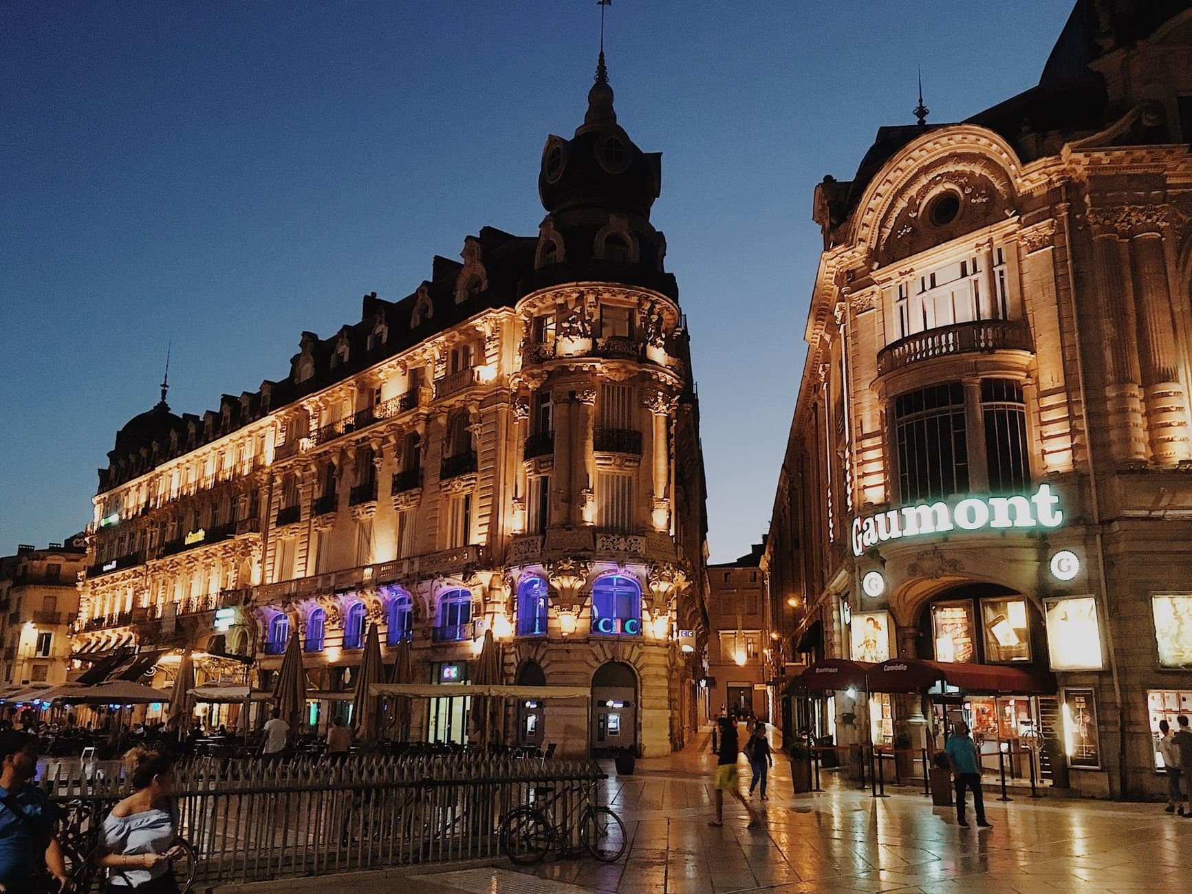Stunning view of illuminated buildings in Montpellier's urban landscape at dusk.