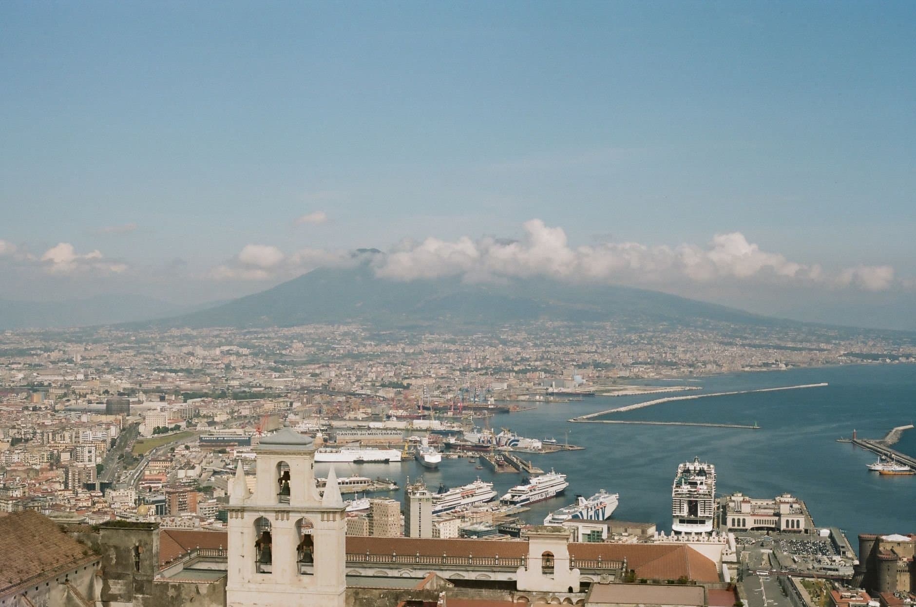 Panoramic aerial view of Naples and Mount Vesuvius on a clear day.