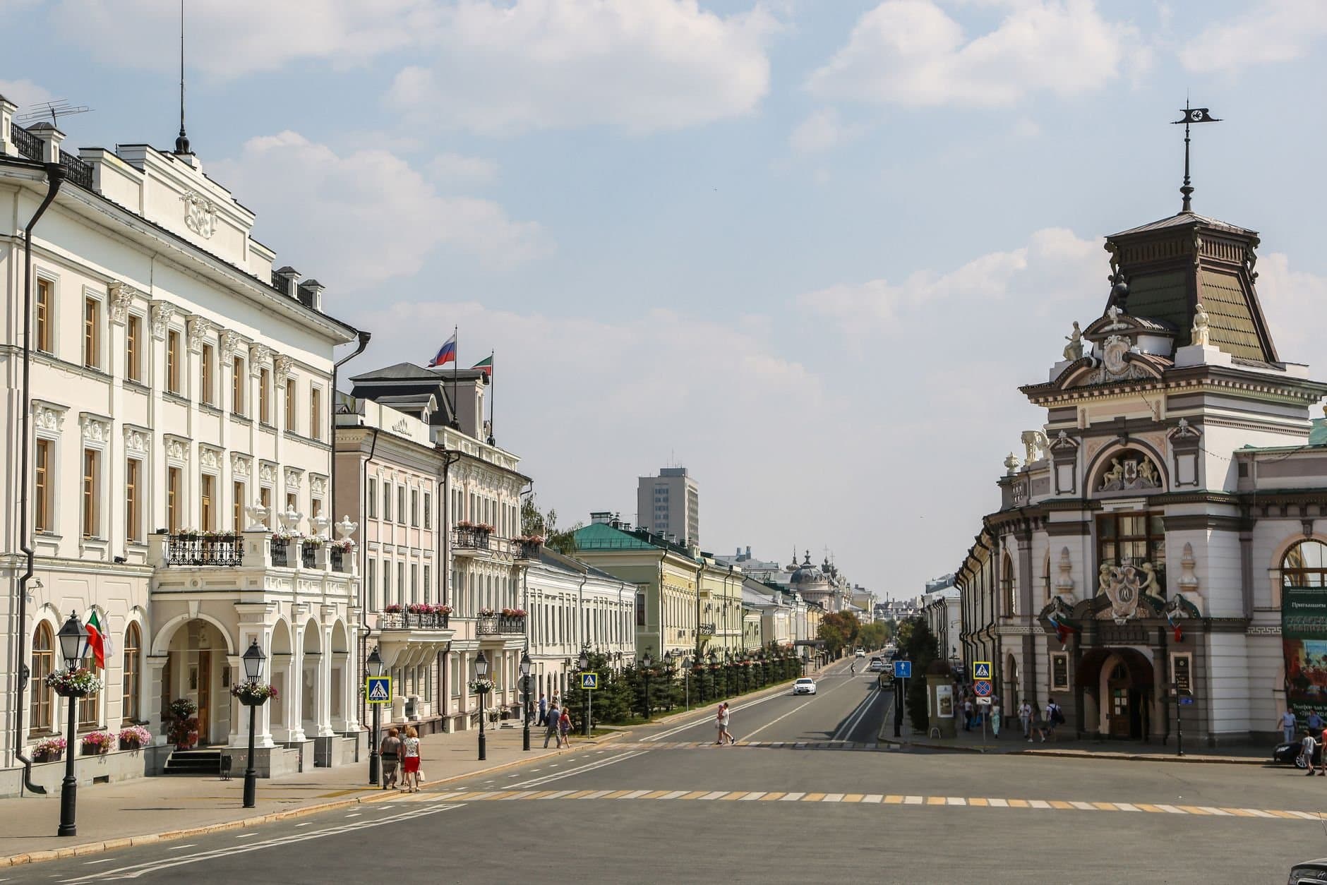 A vibrant city street in Kazan, showcasing historic architecture.