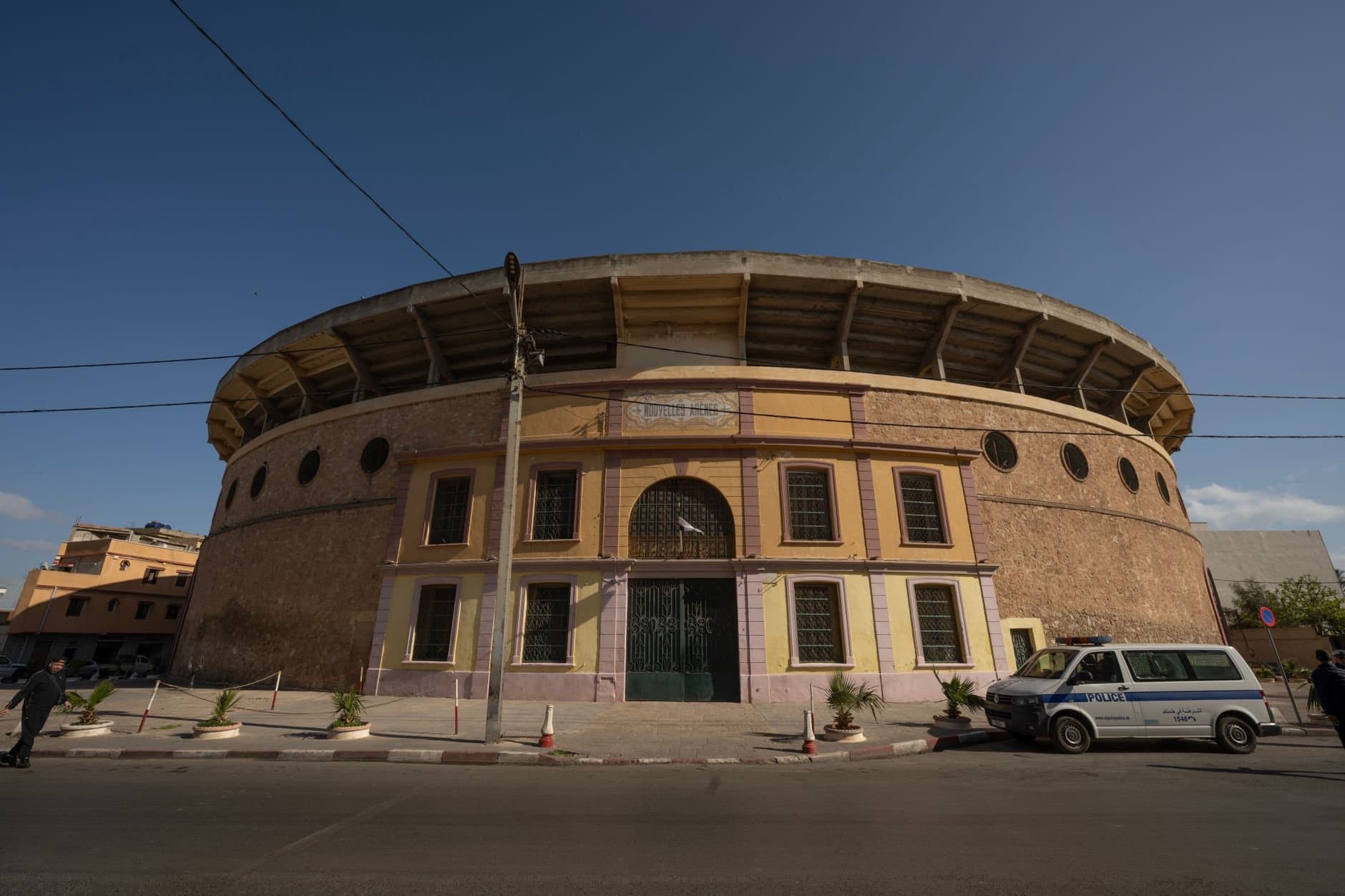 An iconic bullring structure in Orán, Algeria, captured in a daylight setting.