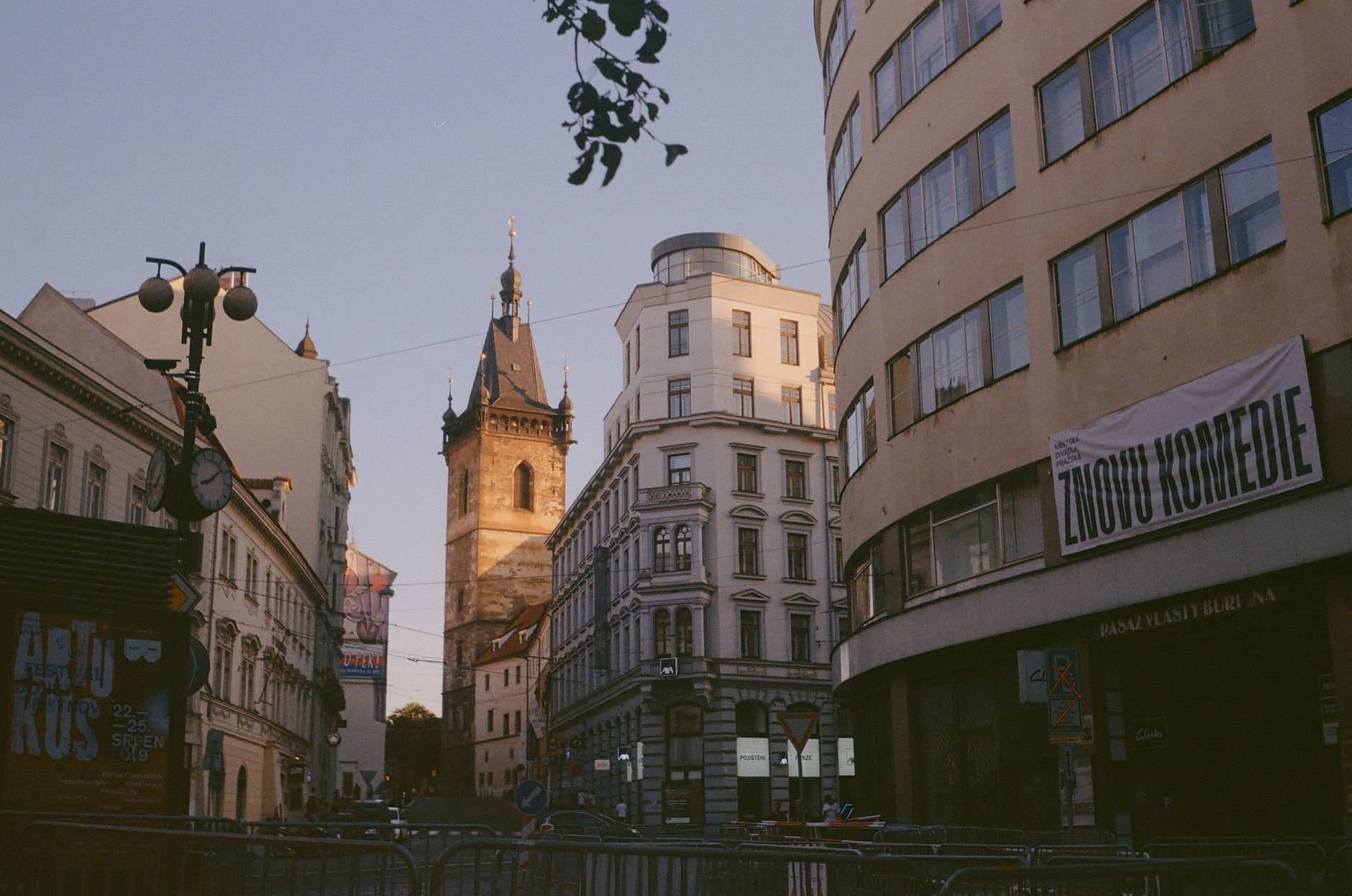 A beautiful view of urban architecture in Prague's Old Town at sunset.