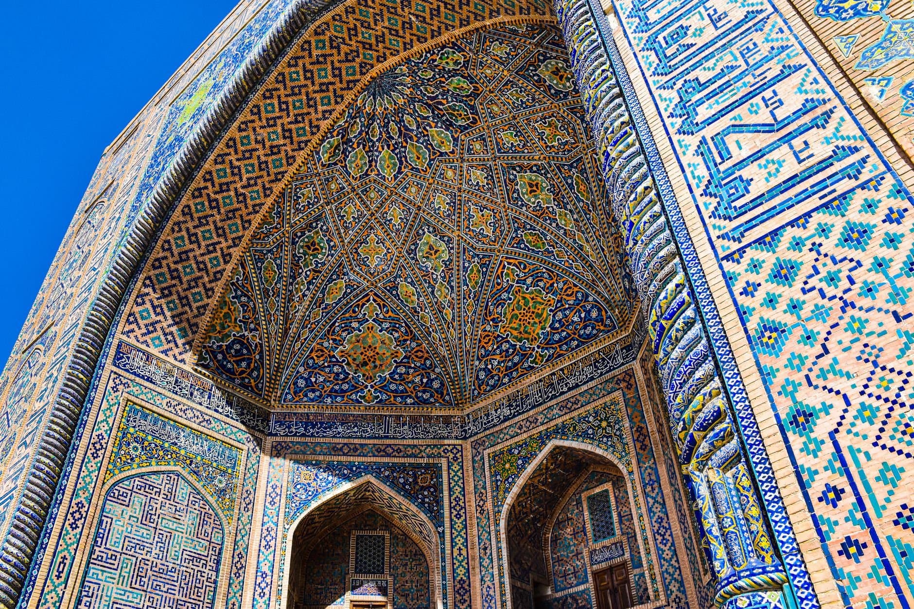 Discover the ornate tilework and Islamic architecture of Registan Square, Samarkand, Uzbekistan.