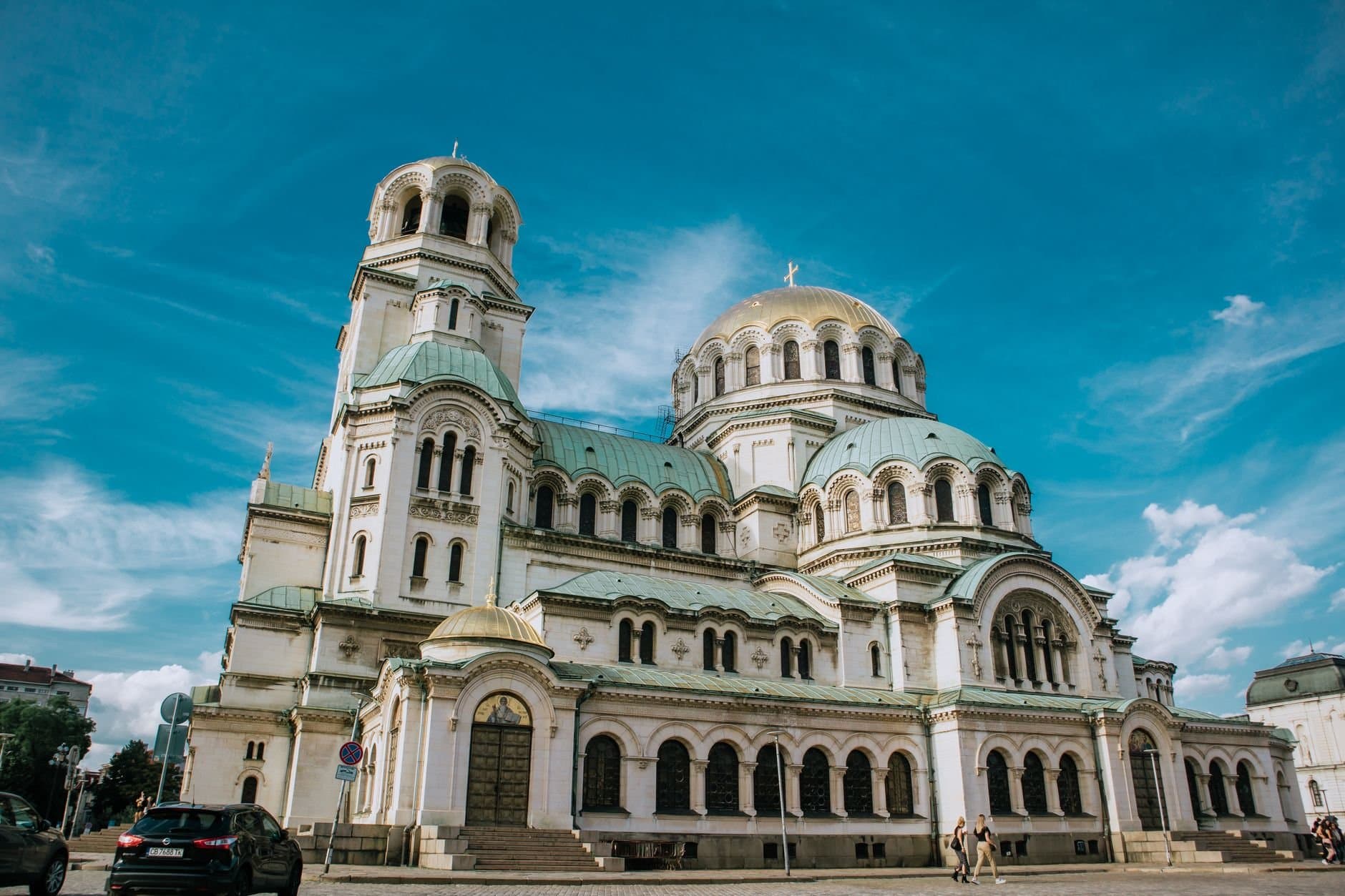 Majestic view of Alexander Nevsky Cathedral against a vibrant blue sky.