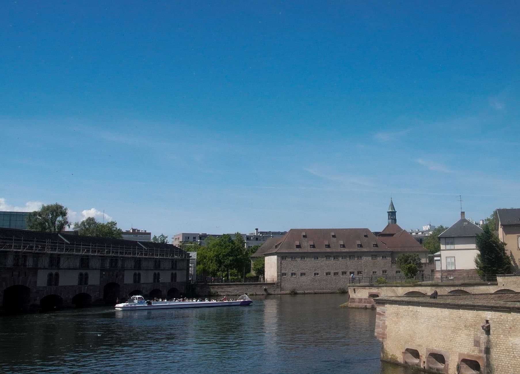 Enjoy a picturesque boat cruise along the historic canals of Strasbourg, France.
