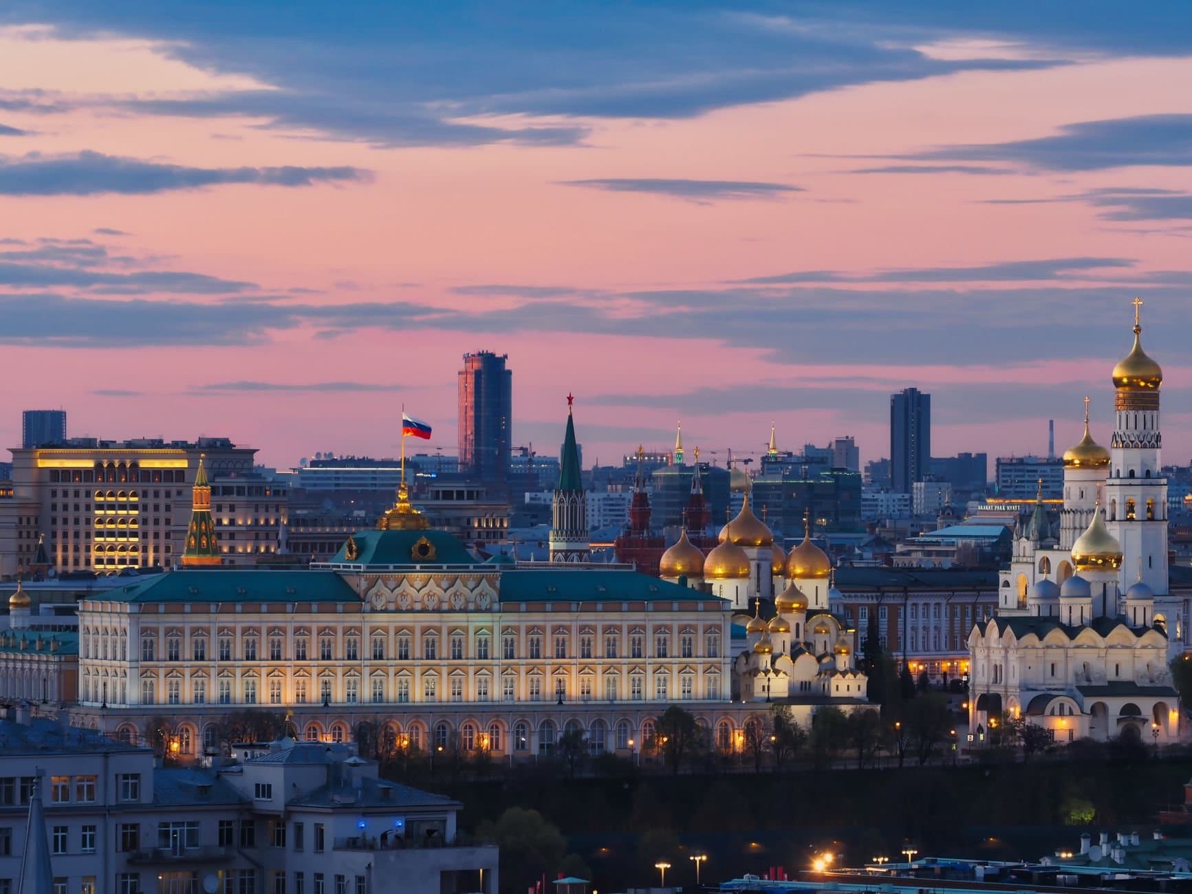 Beautiful Moscow cityscape with Kremlin and cathedrals at sunset.
