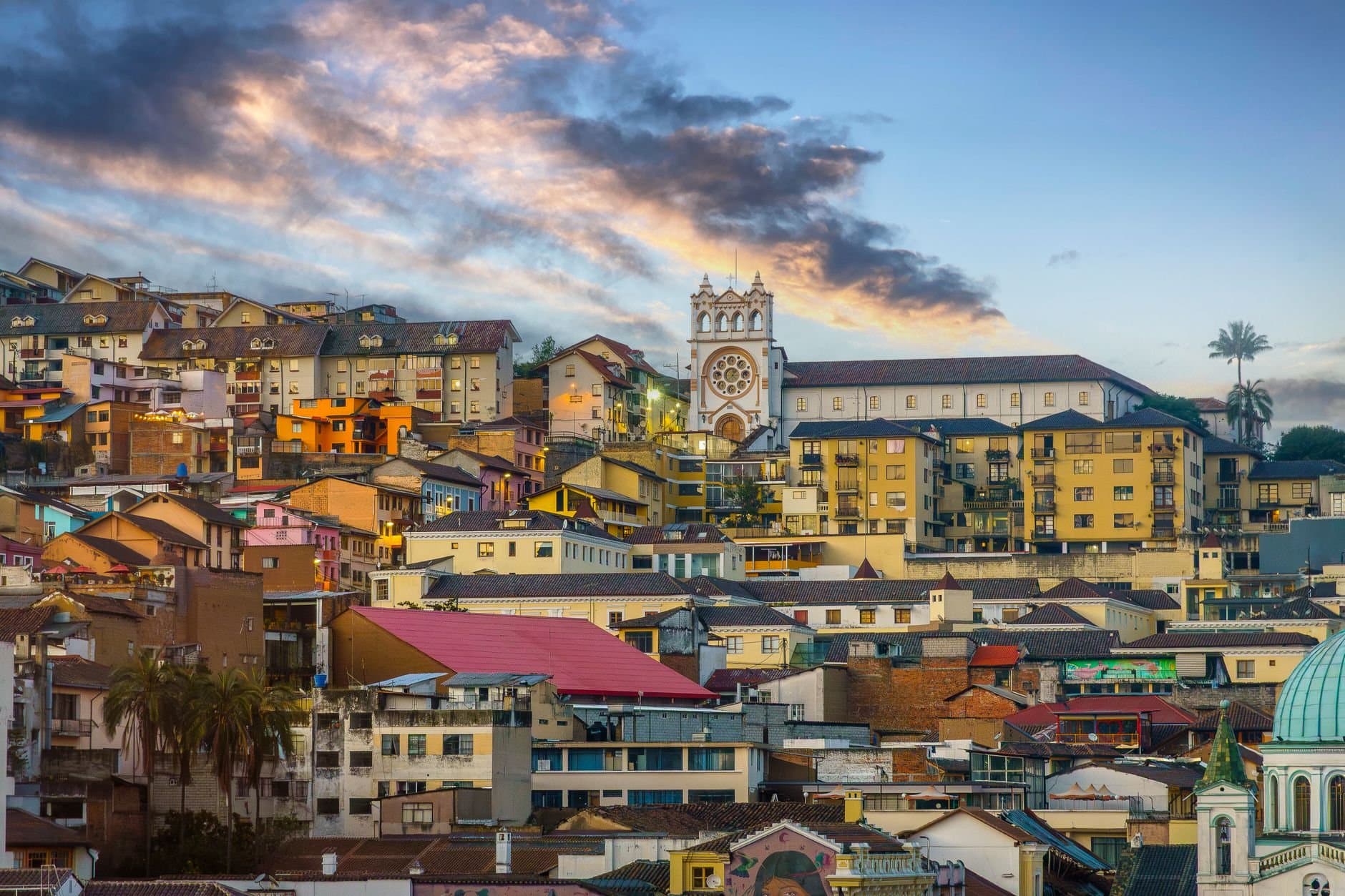 Vibrant view of Antananarivo's architectural blend during sunset, showcasing diverse rooftops and historical charm.