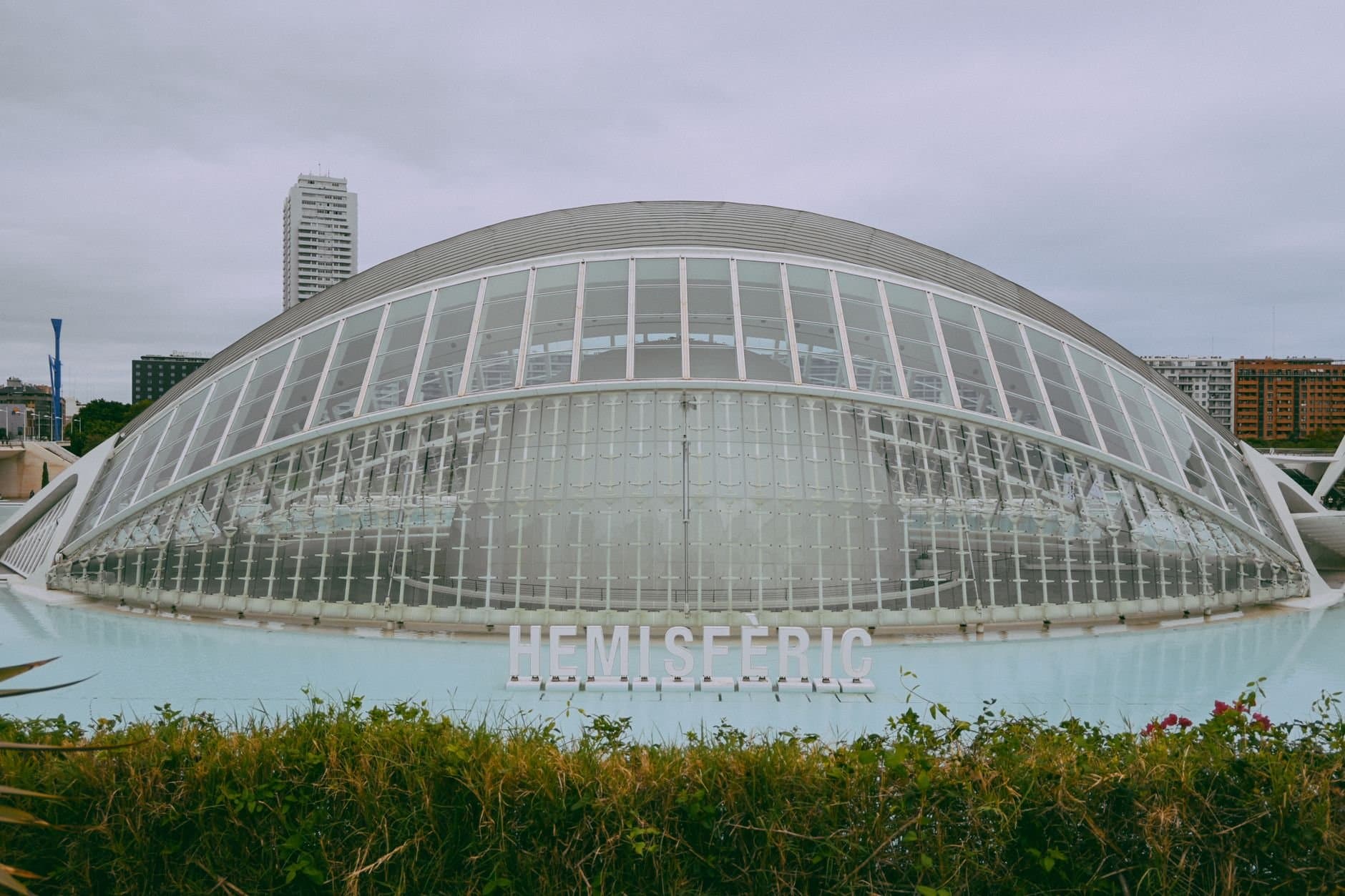 Iconic Hemisferic at City of Arts and Sciences in Valencia, showcasing modern architectural design.