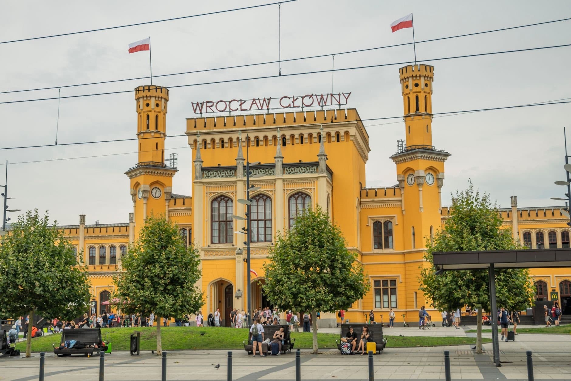 Vibrant facade of Wrocław Główny train station, a key landmark in Wrocław, Poland.