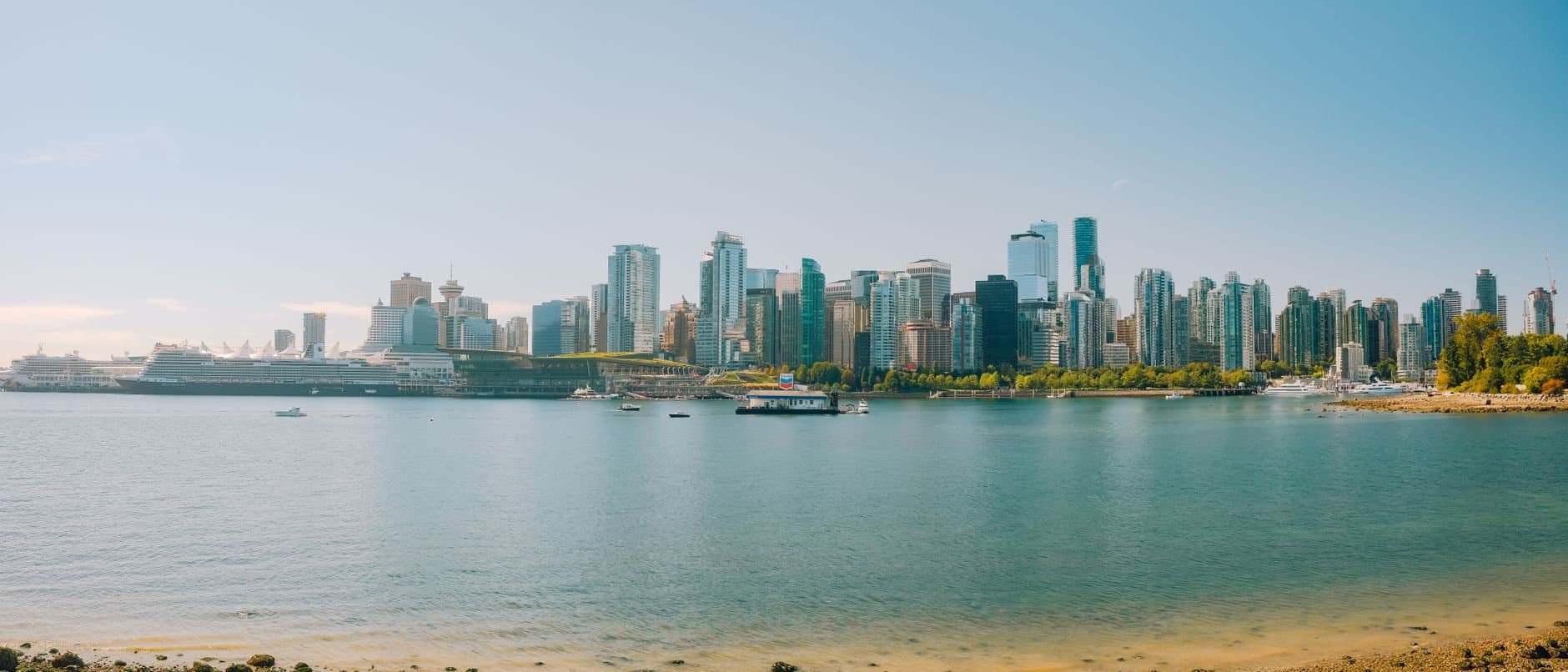 Explore the stunning Vancouver skyline with a picturesque waterfront. Perfect for travel and cityscape enthusiasts.