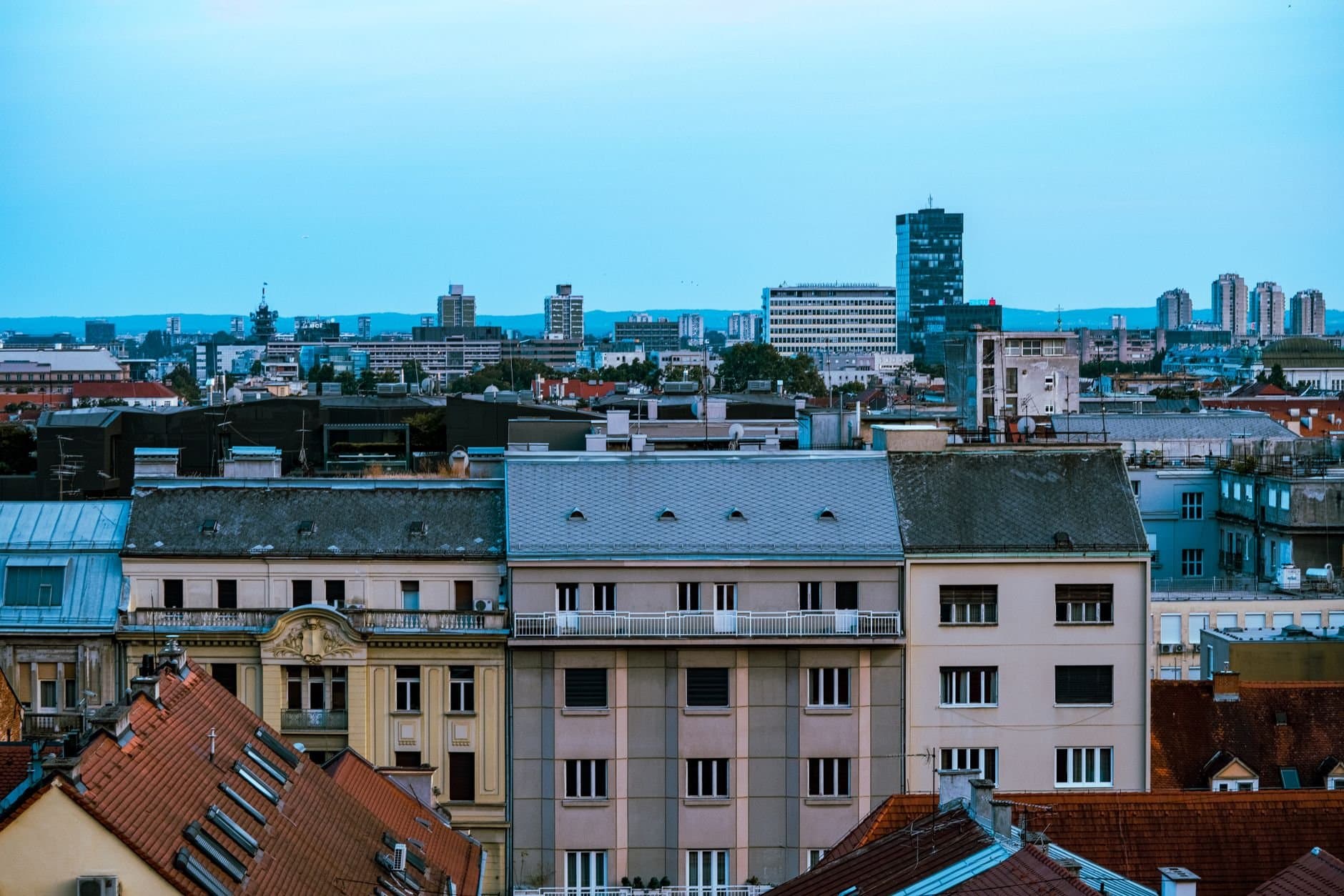 Aerial cityscape of Zagreb showcasing historic buildings and modern skyline.