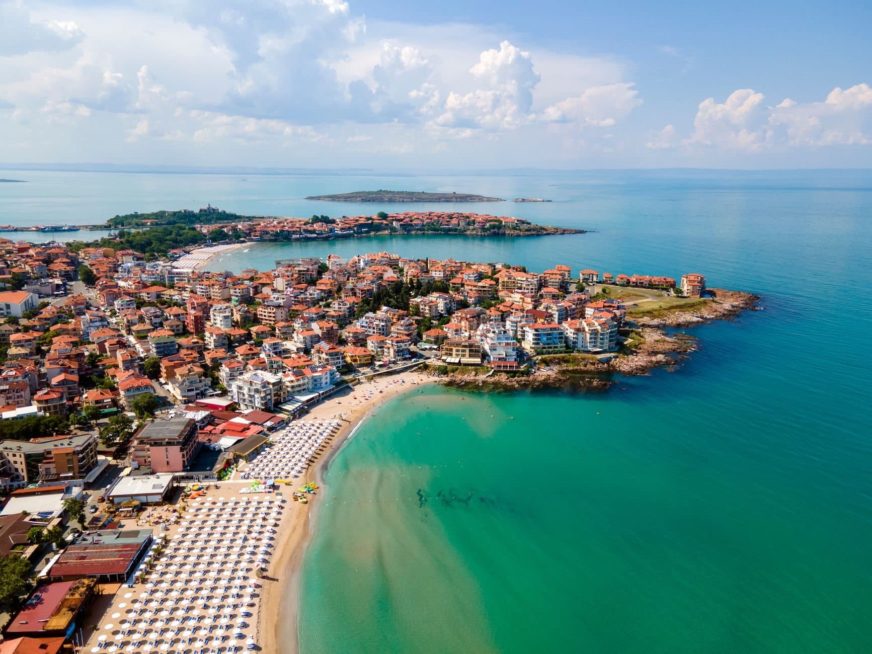 A scenic aerial view of the beautiful Sozopol coastline showcasing its beaches and architecture.