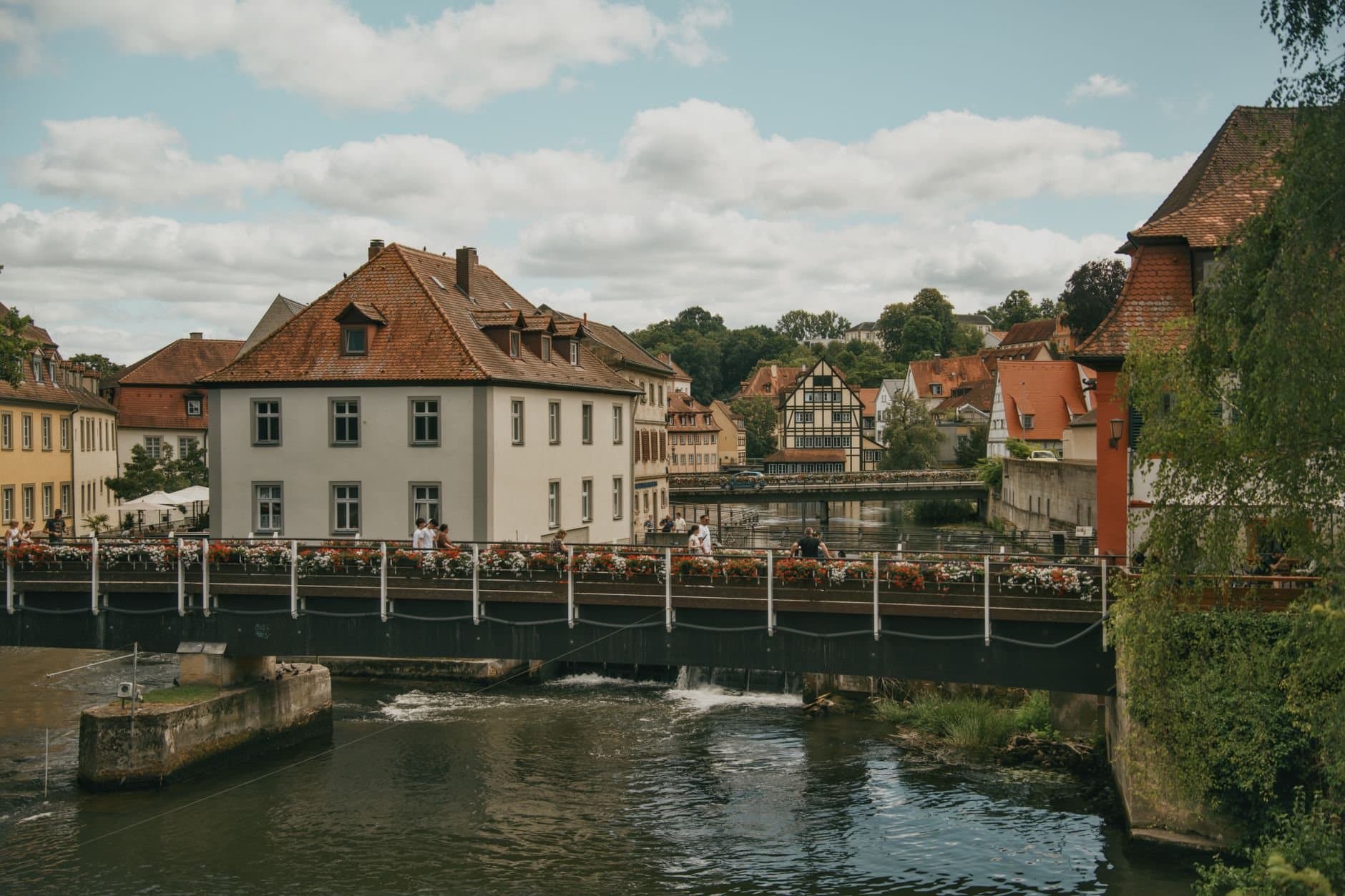 Explore the serene beauty of a German old town with classic architecture and scenic views.