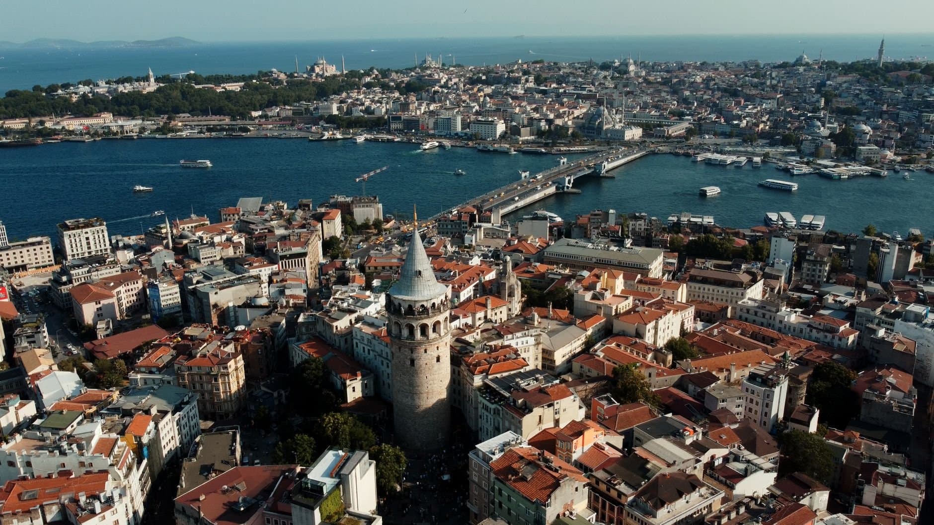 A stunning aerial view capturing Istanbul's Galata Tower and historic cityscape by the Bosphorus.
