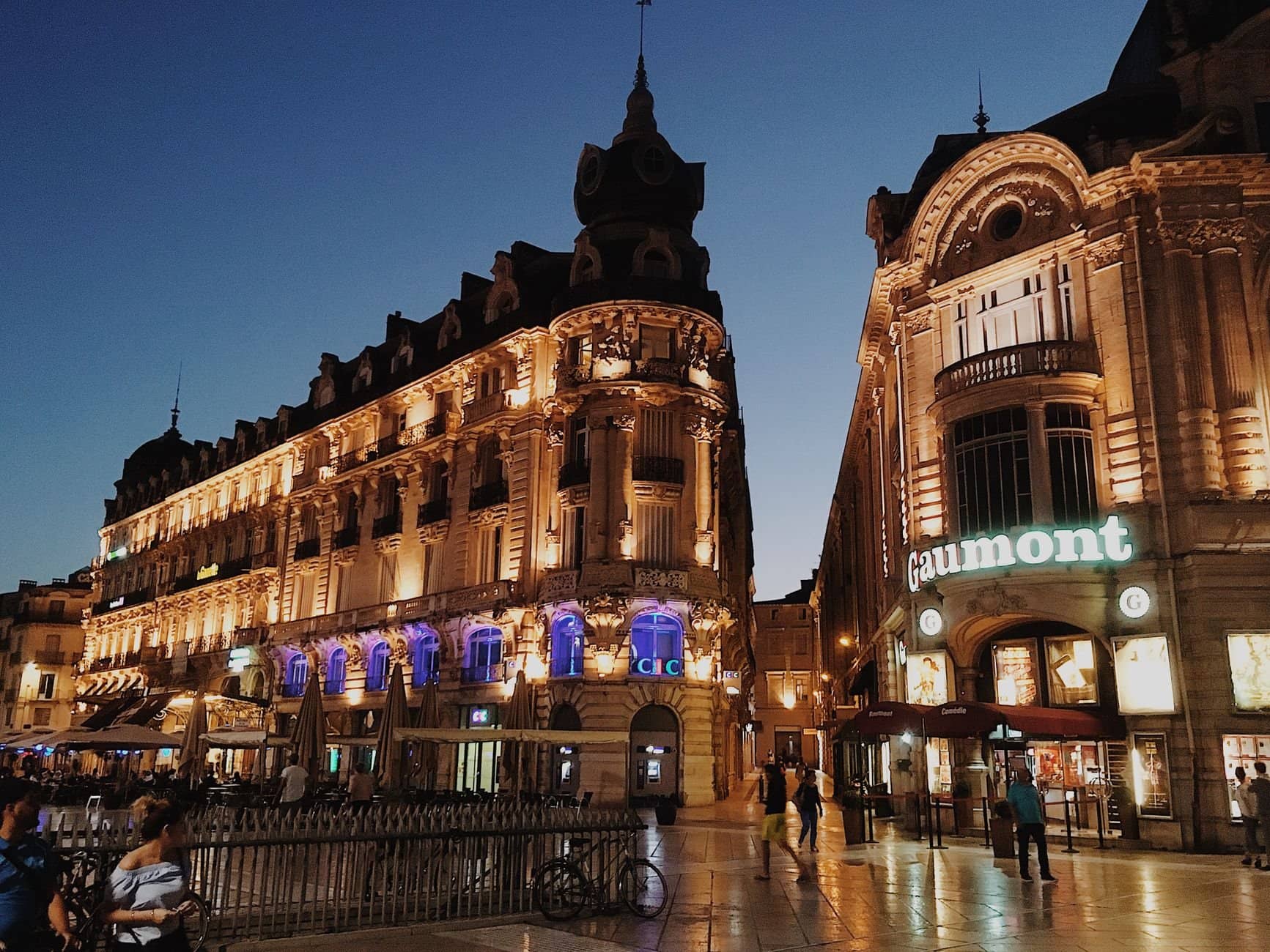 Stunning view of illuminated buildings in Montpellier's urban landscape at dusk.